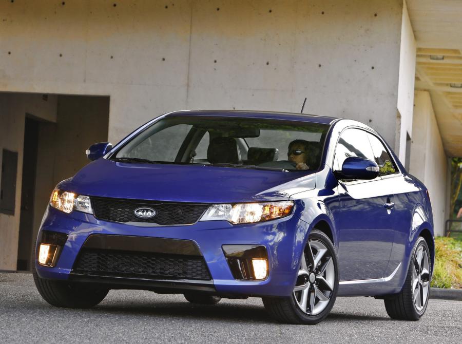  Kia Forte Koup 2009 года  (фото 156 из 169)